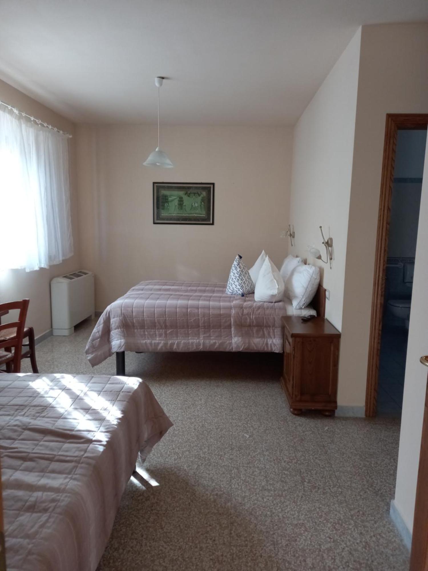 BnB Villa Melany vicino Centro Lucca Camera foto
